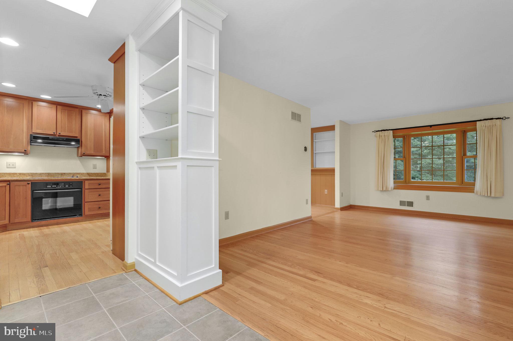 110 Linden Boulevard Middletown, MD 21769 - Photo 3 of 38 an empty room with windows and fireplace