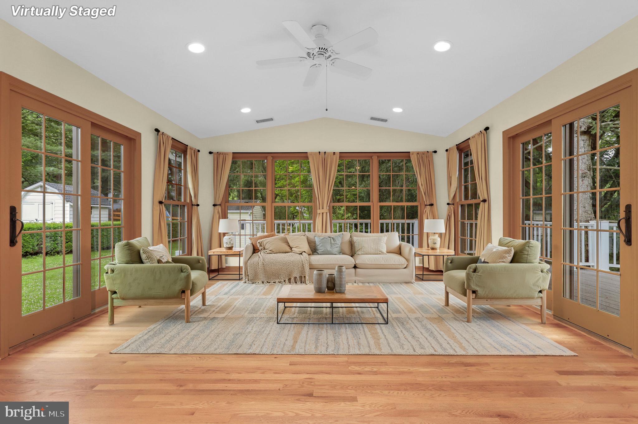 110 Linden Boulevard Middletown, MD 21769 - Photo 7 of 38 a living room with furniture large windows and wooden floor