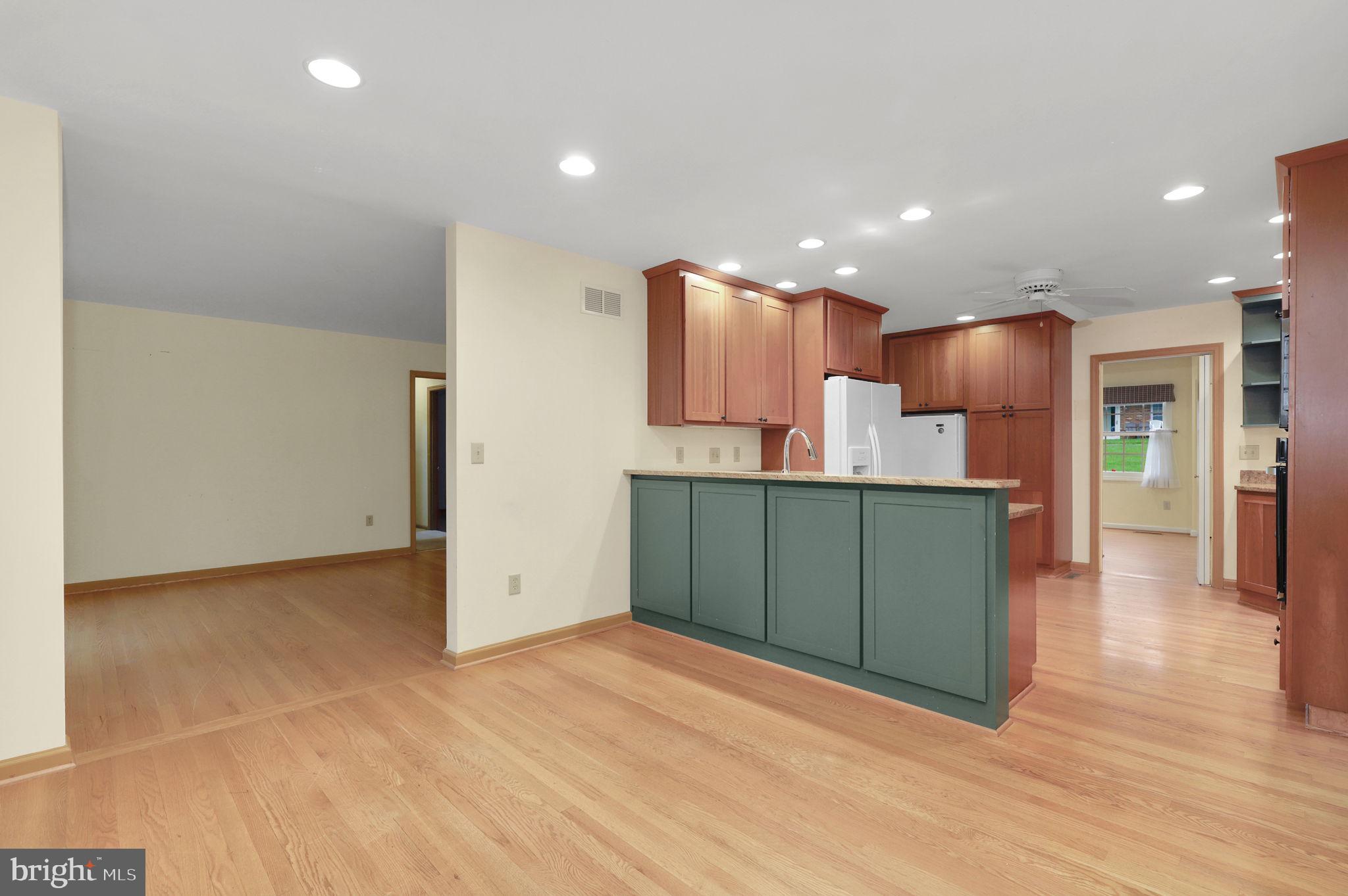 110 Linden Boulevard Middletown, MD 21769 - Photo 10 of 38 a kitchen with stainless steel appliances granite countertop a refrigerator and a microwave
