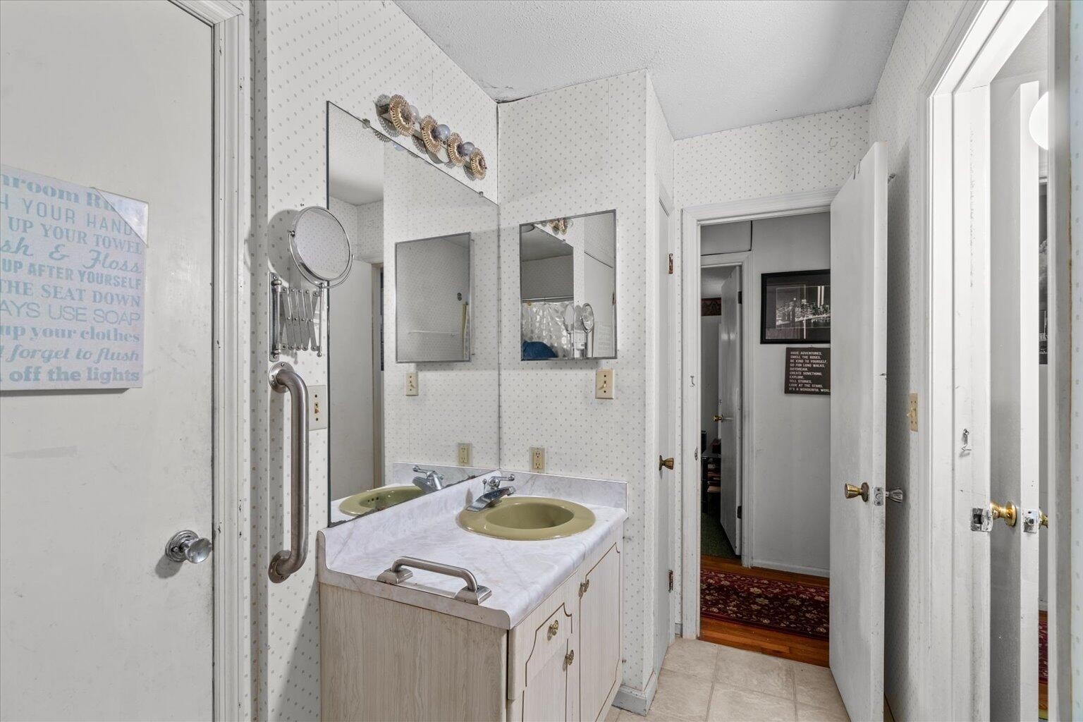 313 North Tibbs Road Dalton, GA 30720 - Photo 30 of 39 a bathroom with a sink toilet and shower