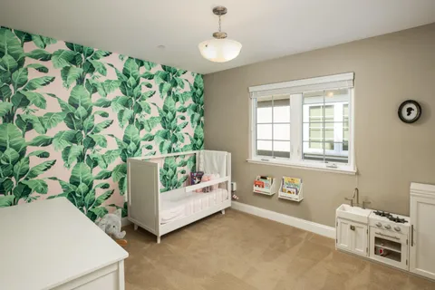 a living room with a couch and a table