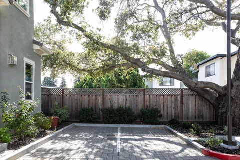 a view of a backyard with green space
