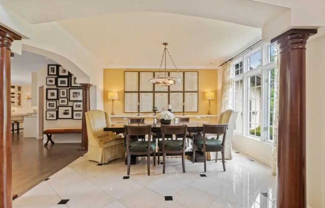 a view of a dining room with furniture window and outside view