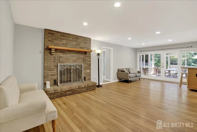 a kitchen with stainless steel appliances granite countertop a refrigerator stove and sink