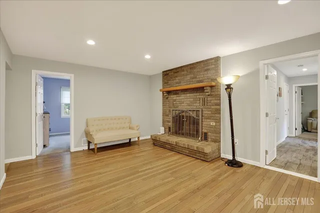 a kitchen with stainless steel appliances a refrigerator and a stove top oven