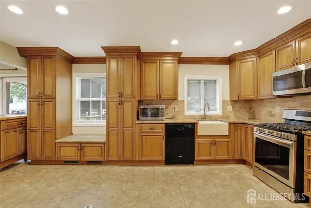 a bedroom with a bed and painting on the wall