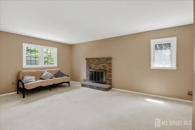 a view of a workspace with furniture