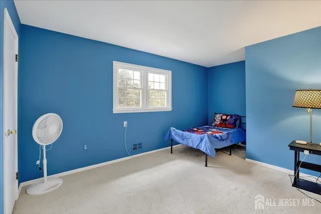 an aerial view of a house with outdoor space swimming pool and lake view