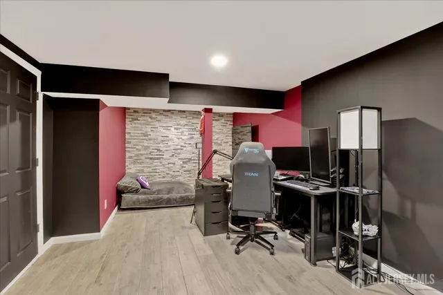 a view of a house with a big yard and a large tree