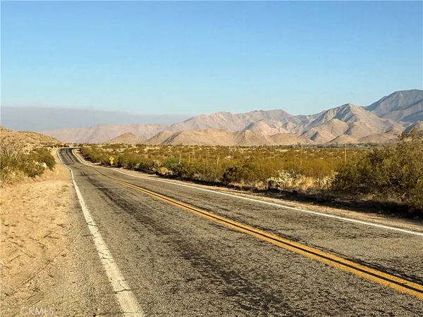 a view of a city with mountain