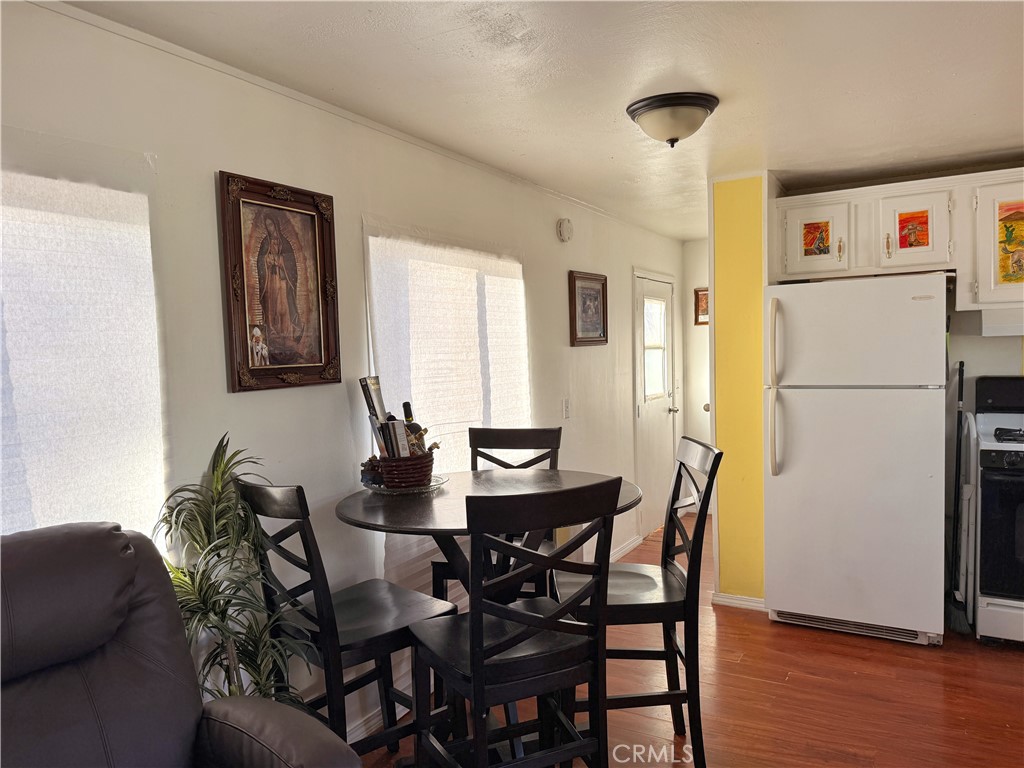 14925 Great Overland Stage Route, Unit A13 Julian, CA 92036 - Photo 6 of 19 a dining room with furniture and window