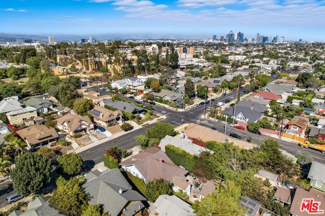 an aerial view of a city with lots of residential buildings