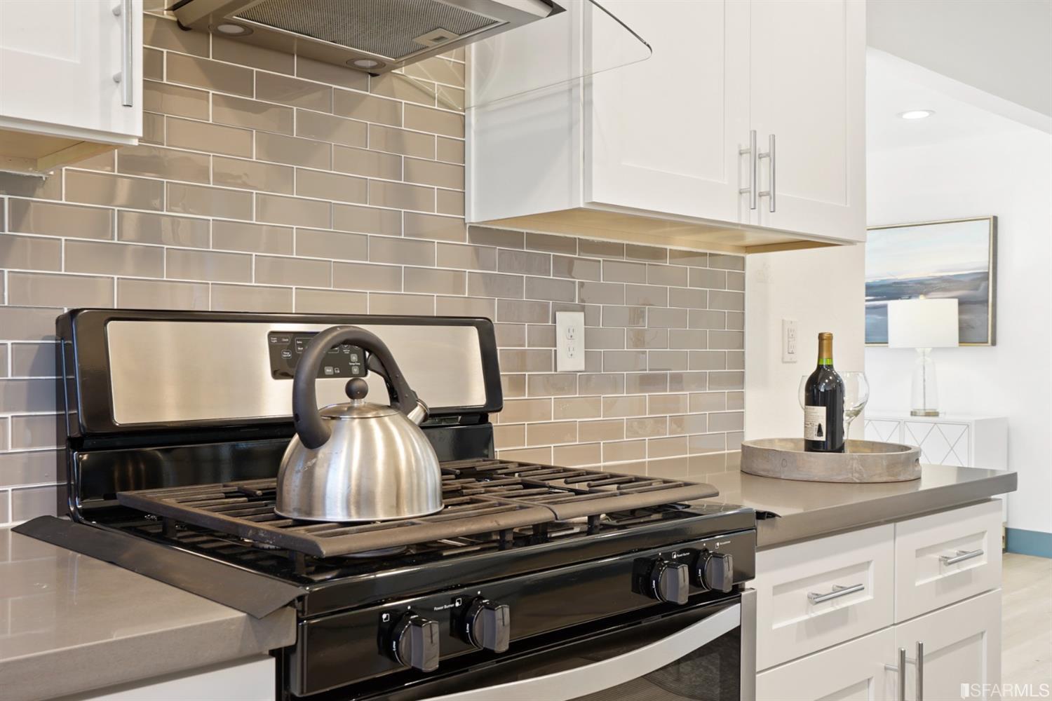 3143 Cadman Road Fremont, CA 94538 - Photo 12 of 54 a stove top oven sitting inside of a kitchen