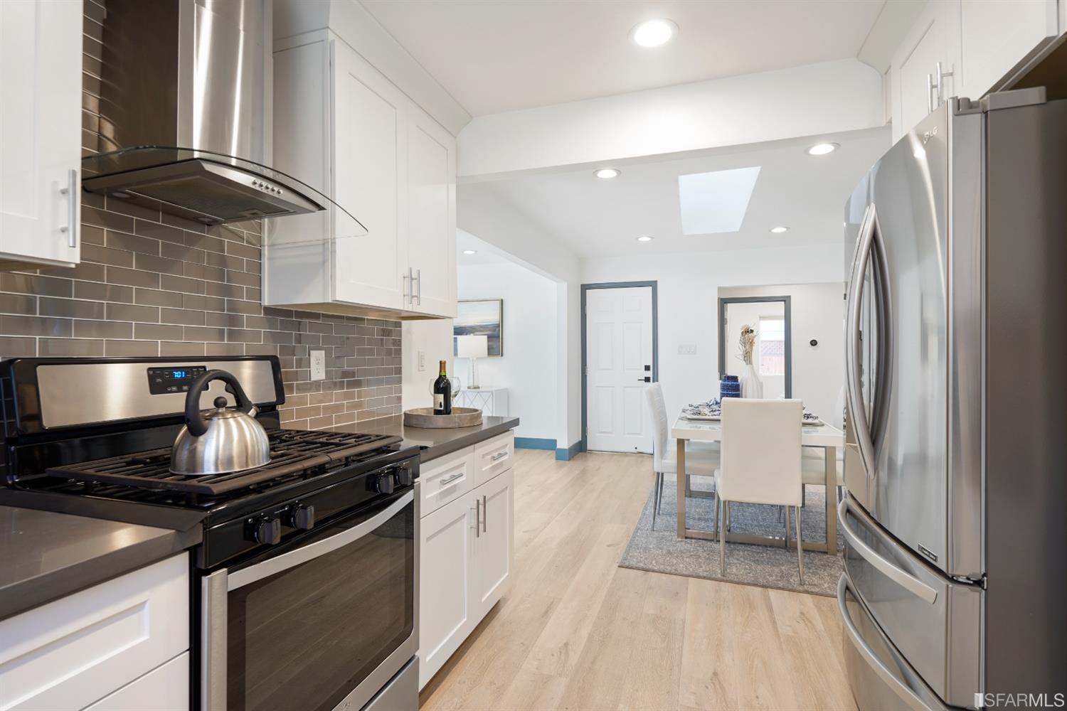 3143 Cadman Road Fremont, CA 94538 - Photo 13 of 54 a kitchen with stainless steel appliances granite countertop a stove and a refrigerator