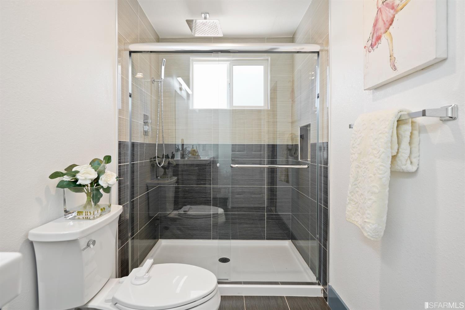 3143 Cadman Road Fremont, CA 94538 - Photo 16 of 54 a bathroom with a sink a toilet and shower