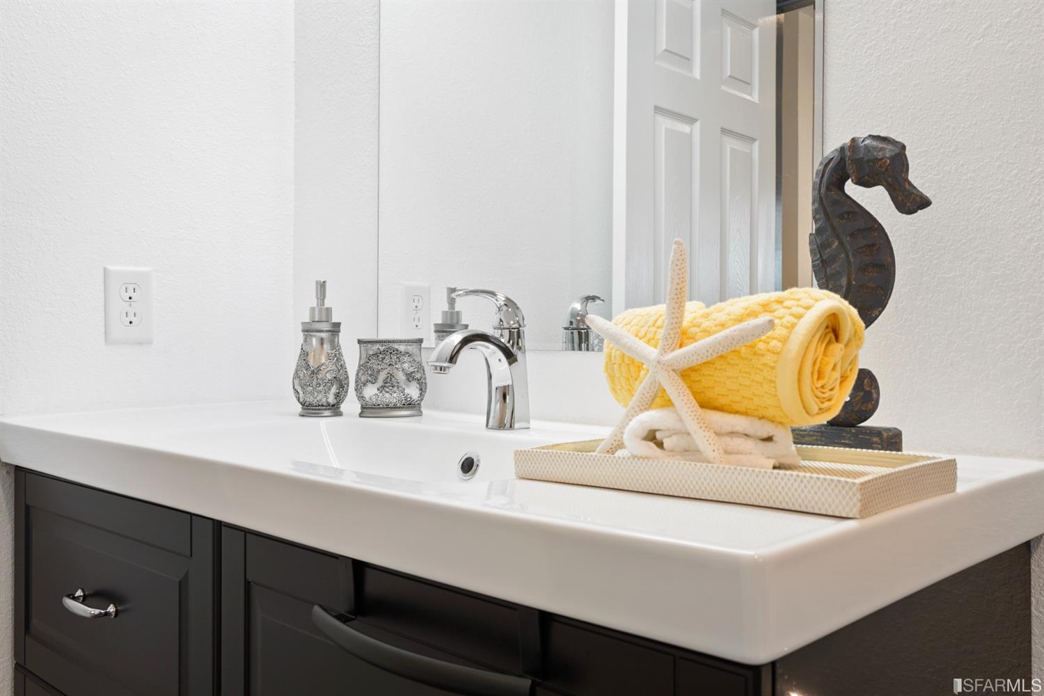 3143 Cadman Road Fremont, CA 94538 - Photo 17 of 54 a bathroom with a sink and a mirror