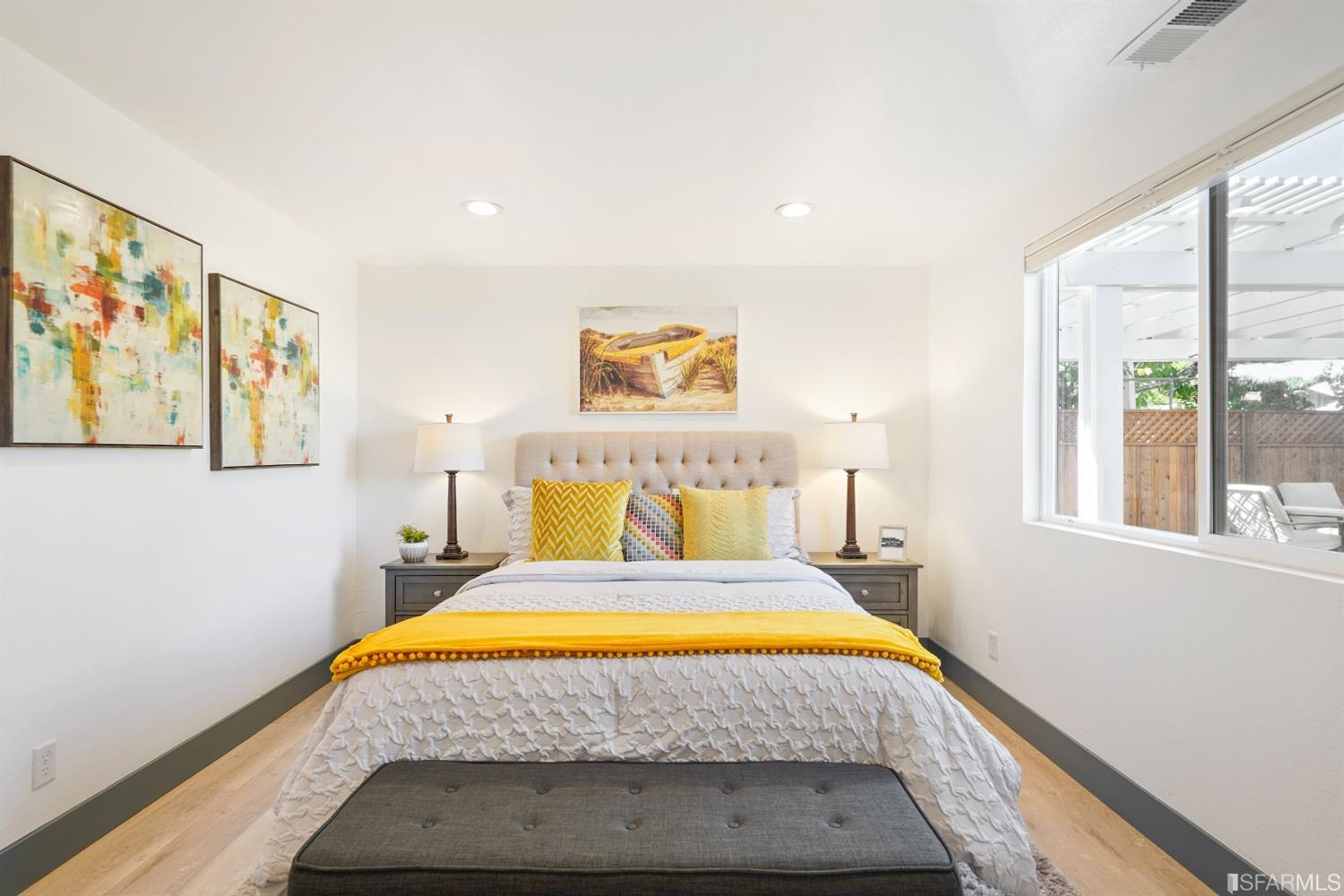 3143 Cadman Road Fremont, CA 94538 - Photo 18 of 54 a bed sitting in a bedroom next to a window