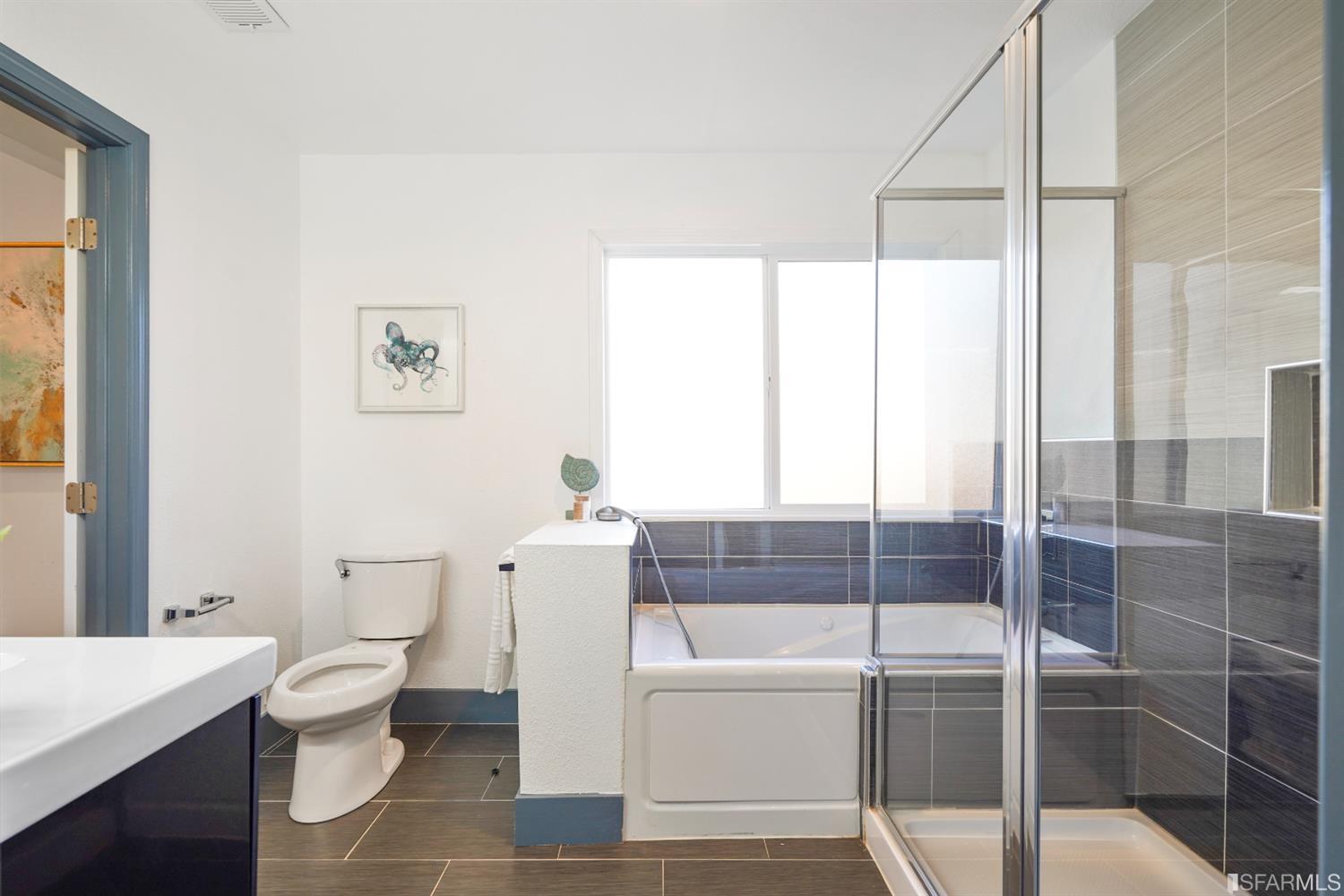 3143 Cadman Road Fremont, CA 94538 - Photo 28 of 54 a bathroom with a toilet a sink and a bathtub