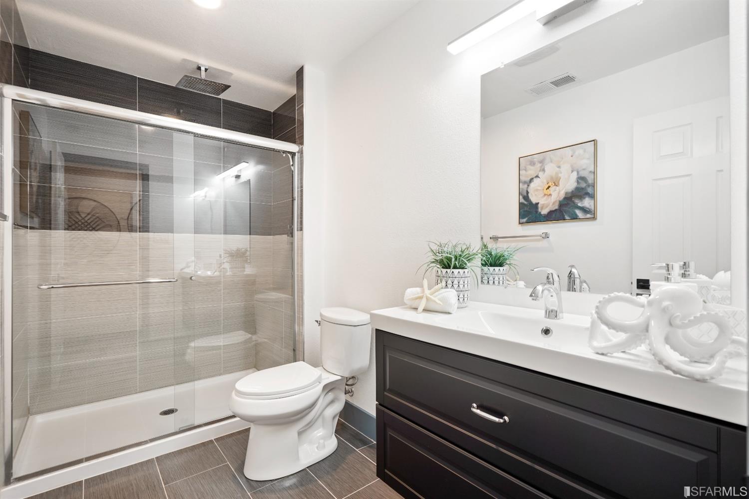 3143 Cadman Road Fremont, CA 94538 - Photo 29 of 54 a bathroom with a sink a toilet and shower