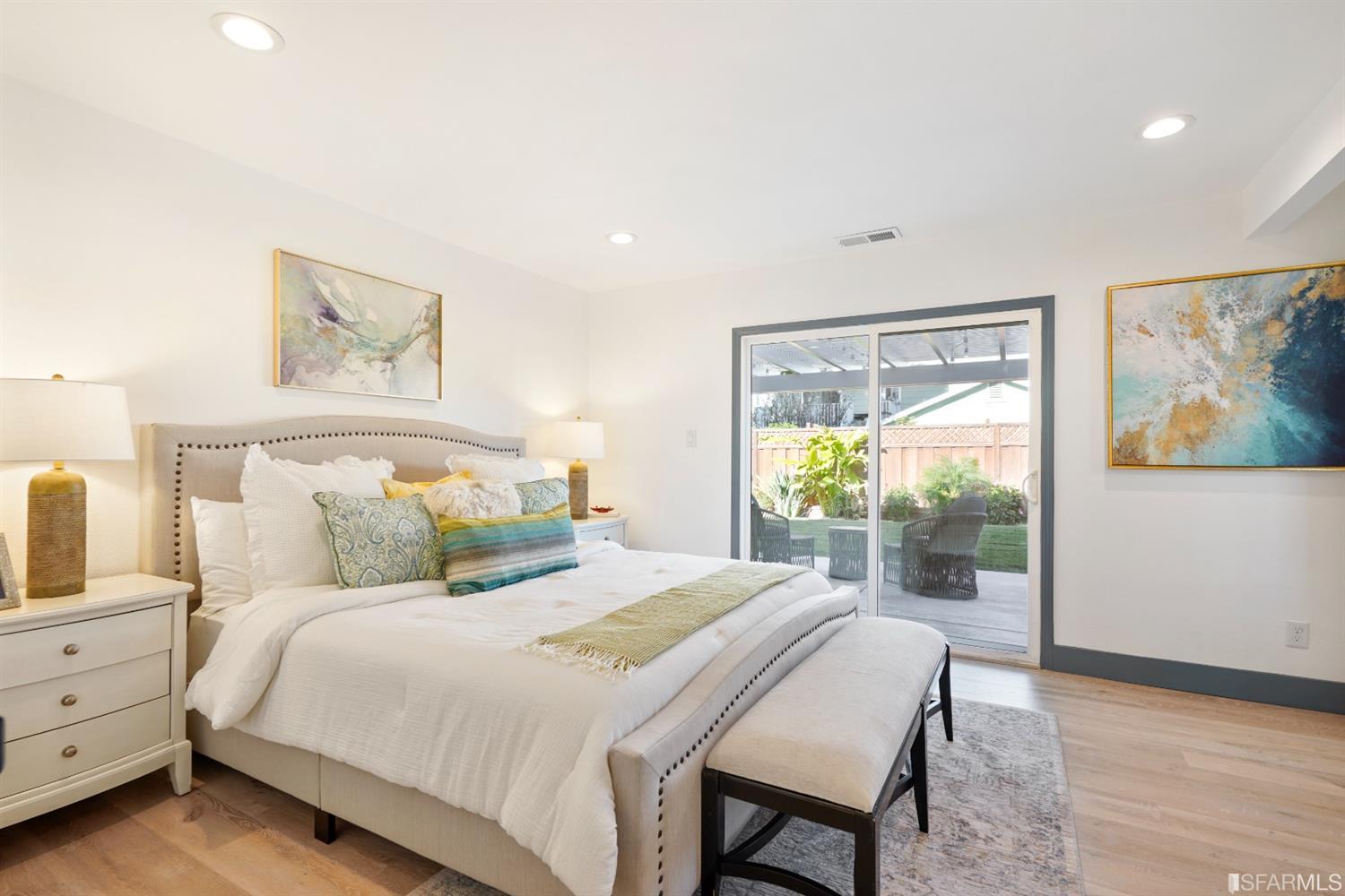 3143 Cadman Road Fremont, CA 94538 - Photo 31 of 54 a bedroom with a bed and a painting on the wall