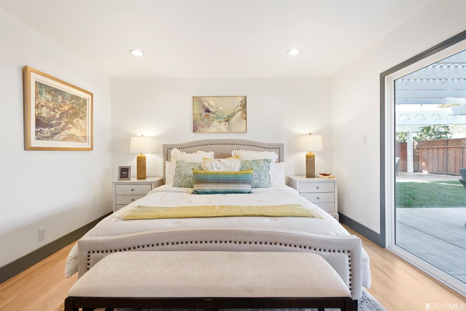 3143 Cadman Road Fremont, CA 94538 - Photo 32 of 54 a bedroom with a large bed and a large window