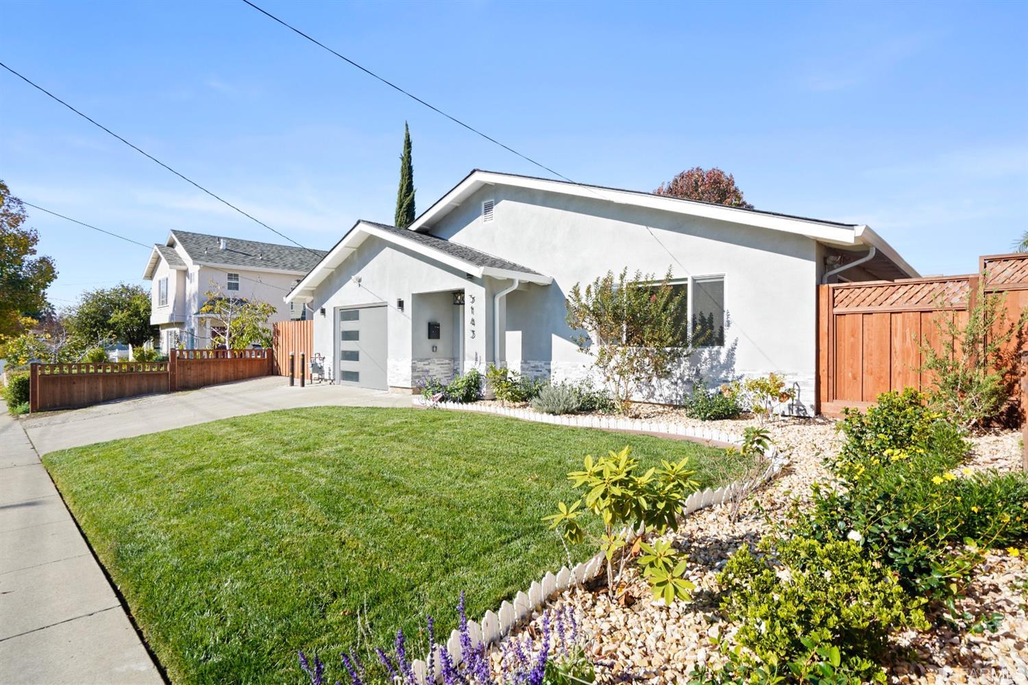 3143 Cadman Road Fremont, CA 94538 - Photo 36 of 54 a view of a house with backyard and garden