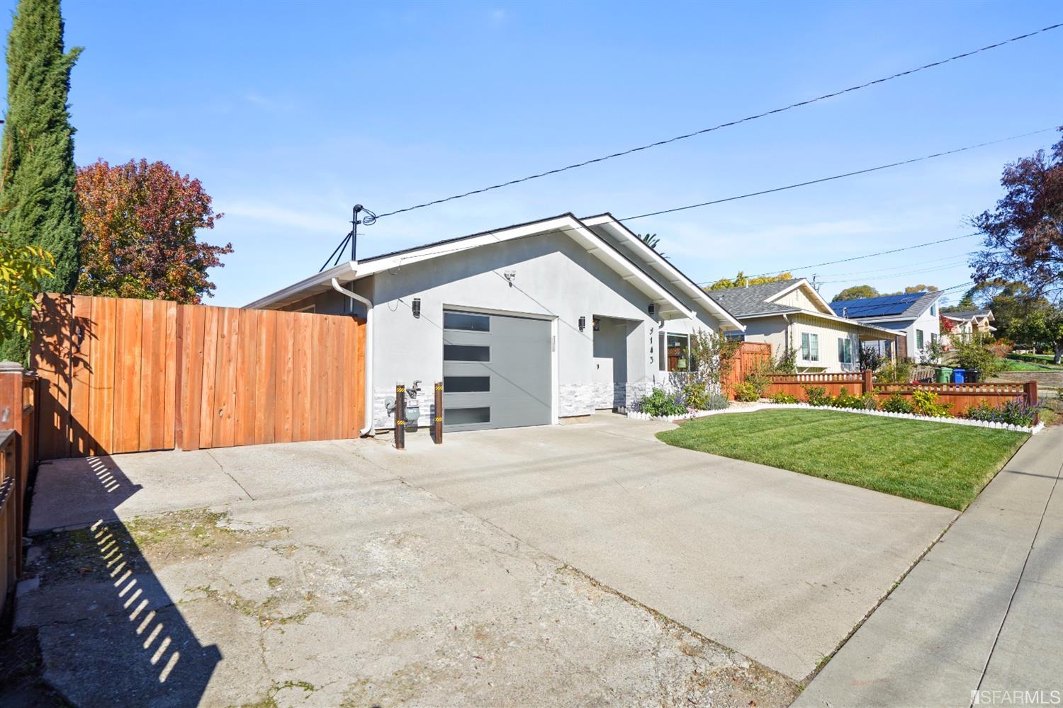 3143 Cadman Road Fremont, CA 94538 - Photo 37 of 54 a front view of a house with a yard