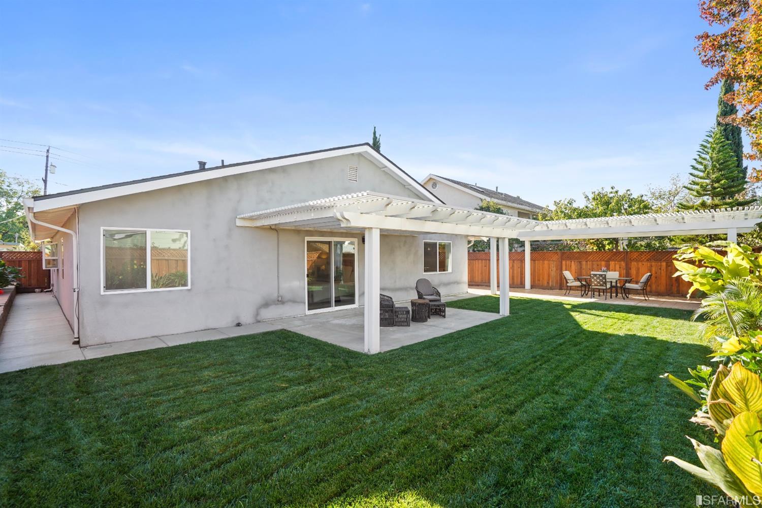 3143 Cadman Road Fremont, CA 94538 - Photo 40 of 54 a front view of a house with garden