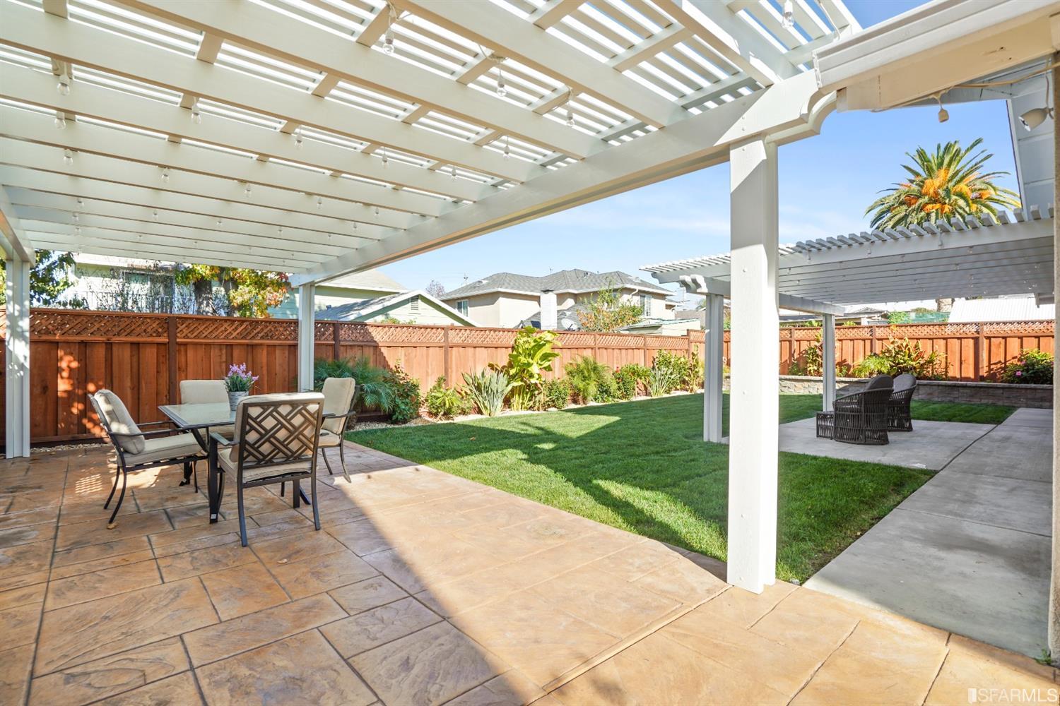 3143 Cadman Road Fremont, CA 94538 - Photo 42 of 54 a view of a patio with a table and chairs