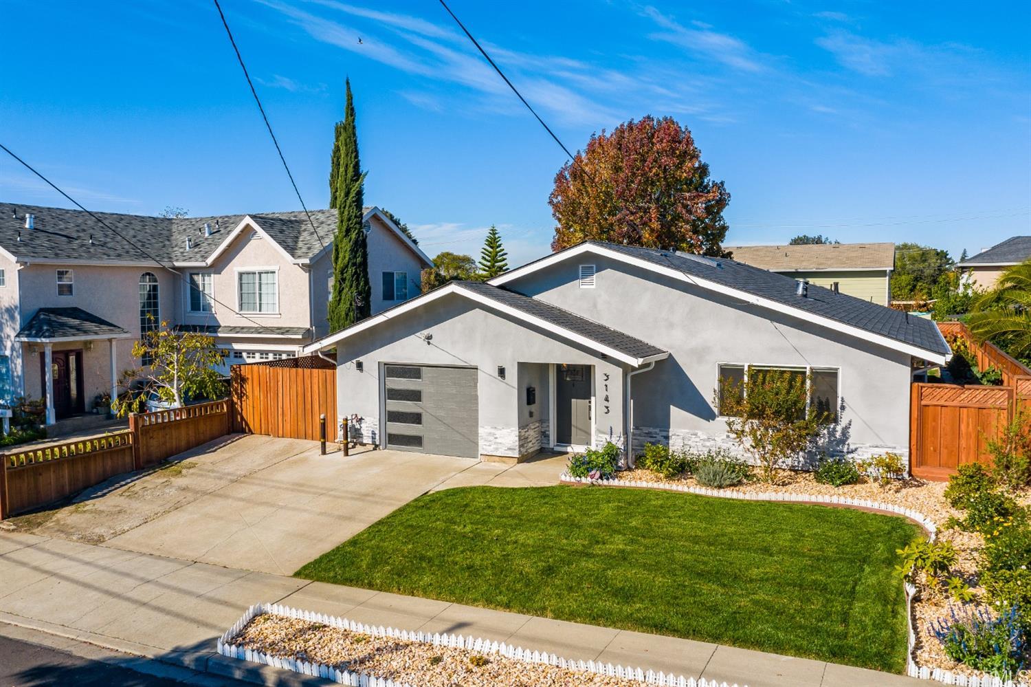 3143 Cadman Road Fremont, CA 94538 - Photo 47 of 54 a front view of a house with a yard