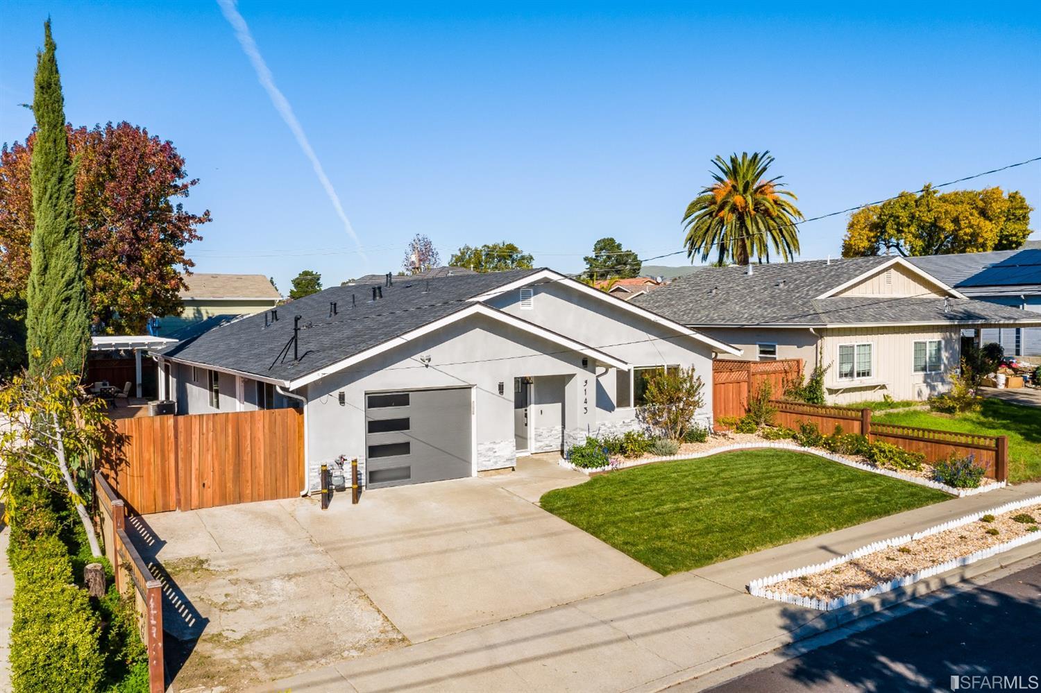 3143 Cadman Road Fremont, CA 94538 - Photo 50 of 54 a view of a house with a yard and potted plants