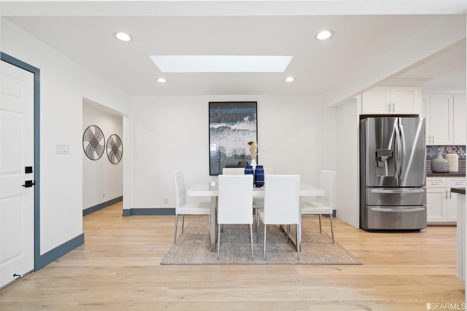 3143 Cadman Road Fremont, CA 94538 - Photo 6 of 54 a dining room with furniture and a wooden floor