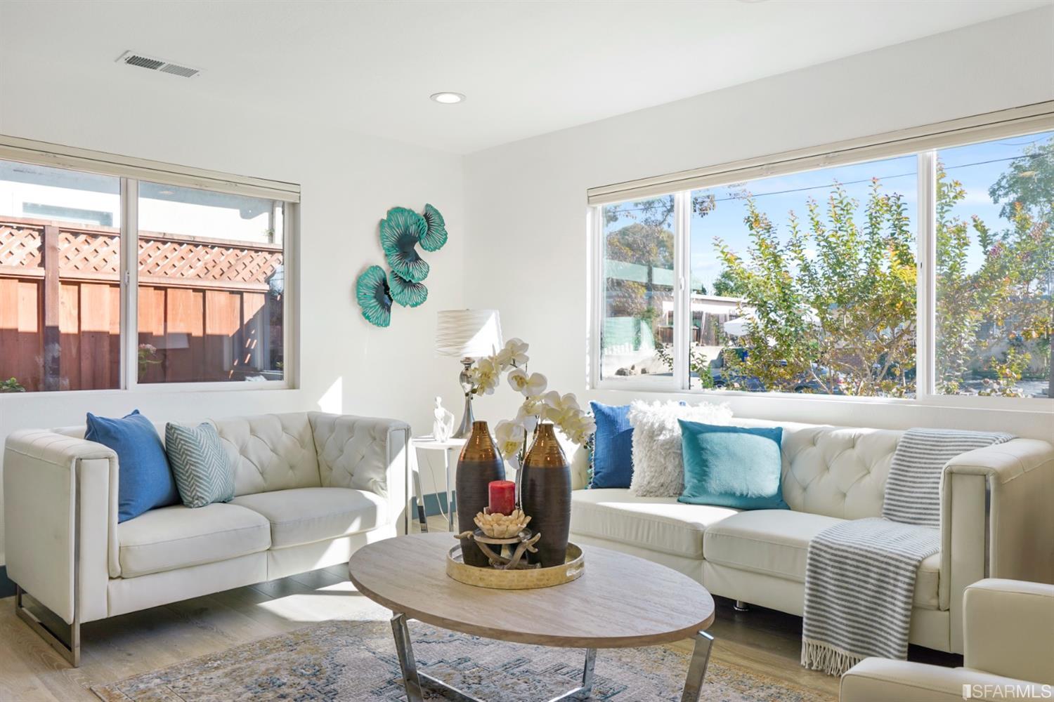 3143 Cadman Road Fremont, CA 94538 - Photo 9 of 54 a living room with furniture and a large window