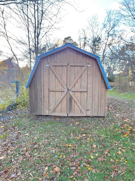 63 West Main Street, Unit 73 Yatesboro, PA 16263 - Photo 33 of 38 a view of backyard with small cabin