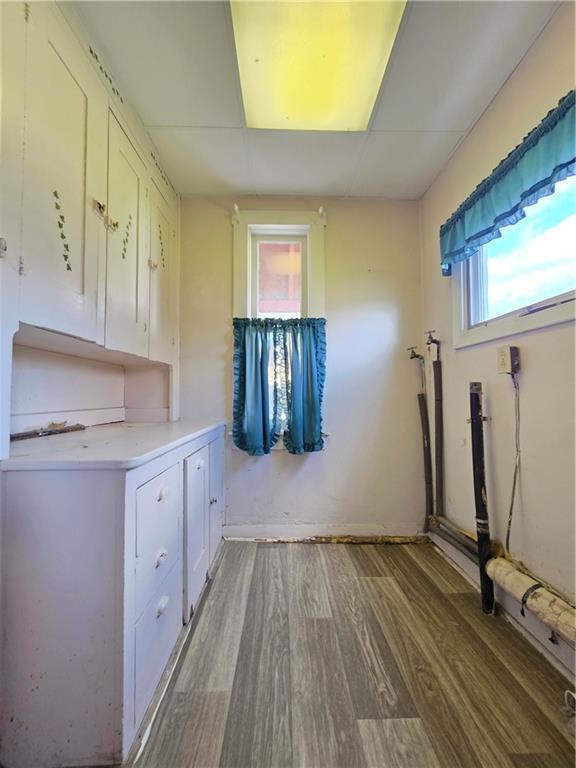 63 West Main Street, Unit 73 Yatesboro, PA 16263 - Photo 38 of 38 a kitchen with wooden floor and window