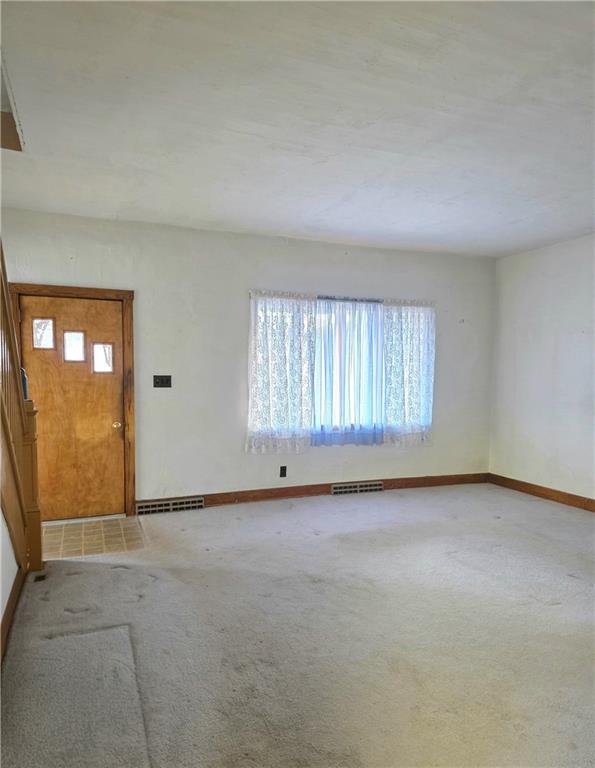 63 West Main Street, Unit 73 Yatesboro, PA 16263 - Photo 8 of 38 an empty room with windows