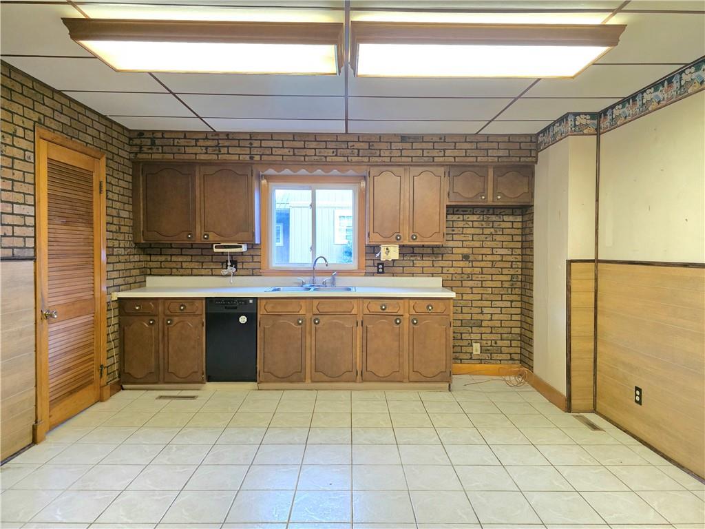 63 West Main Street, Unit 73 Yatesboro, PA 16263 - Photo 10 of 38 a large kitchen with a stove a refrigerator and a sink