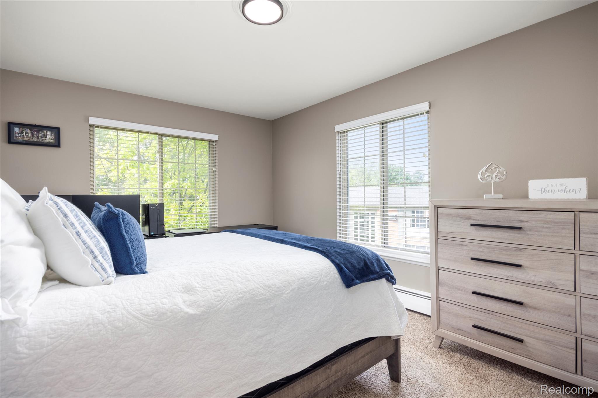 500 Romeo Road, Unit 125 Rochester, MI 48307 - Photo 9 of 14 Bedroom with light carpet