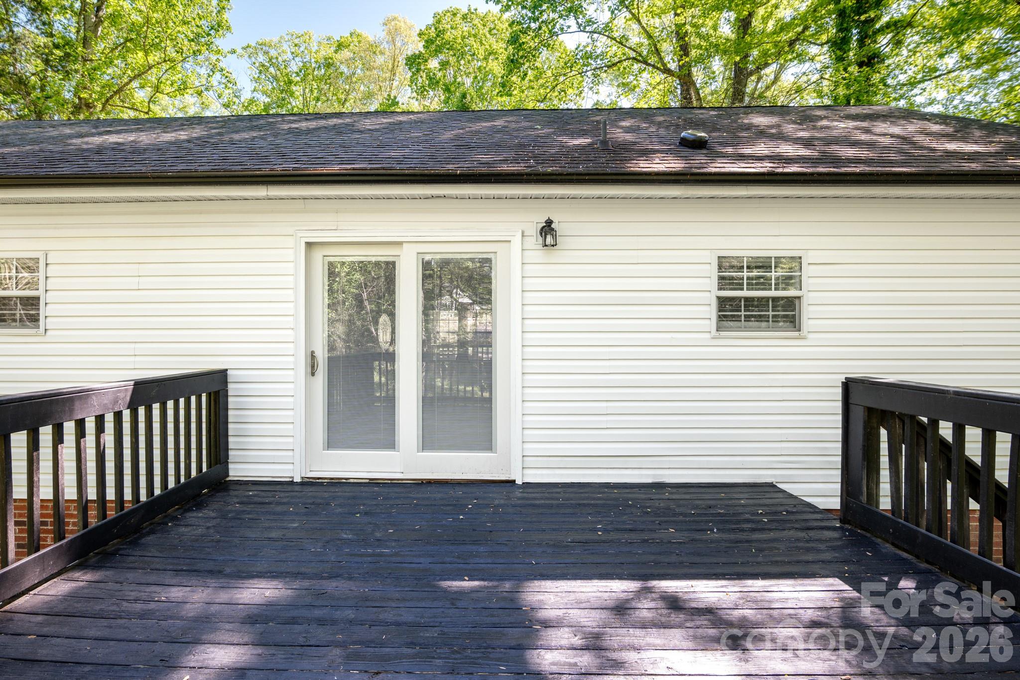 116 Springdale Drive York, SC 29745 - Photo 25 of 32 a view of a brick house with a large window