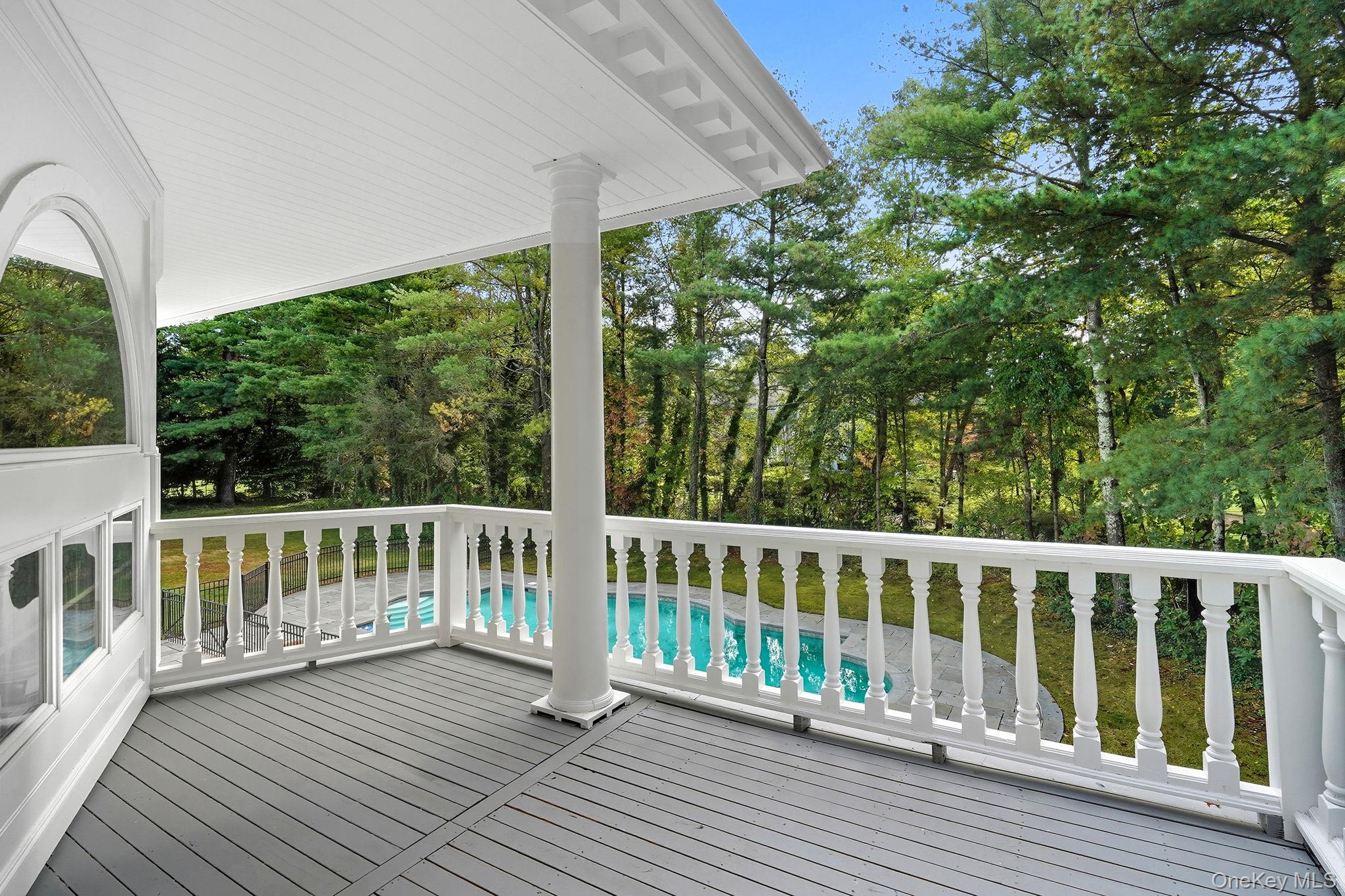10 Cooper Road Scarsdale, NY 10583 - Photo 35 of 47 a view of wooden deck and a yard
