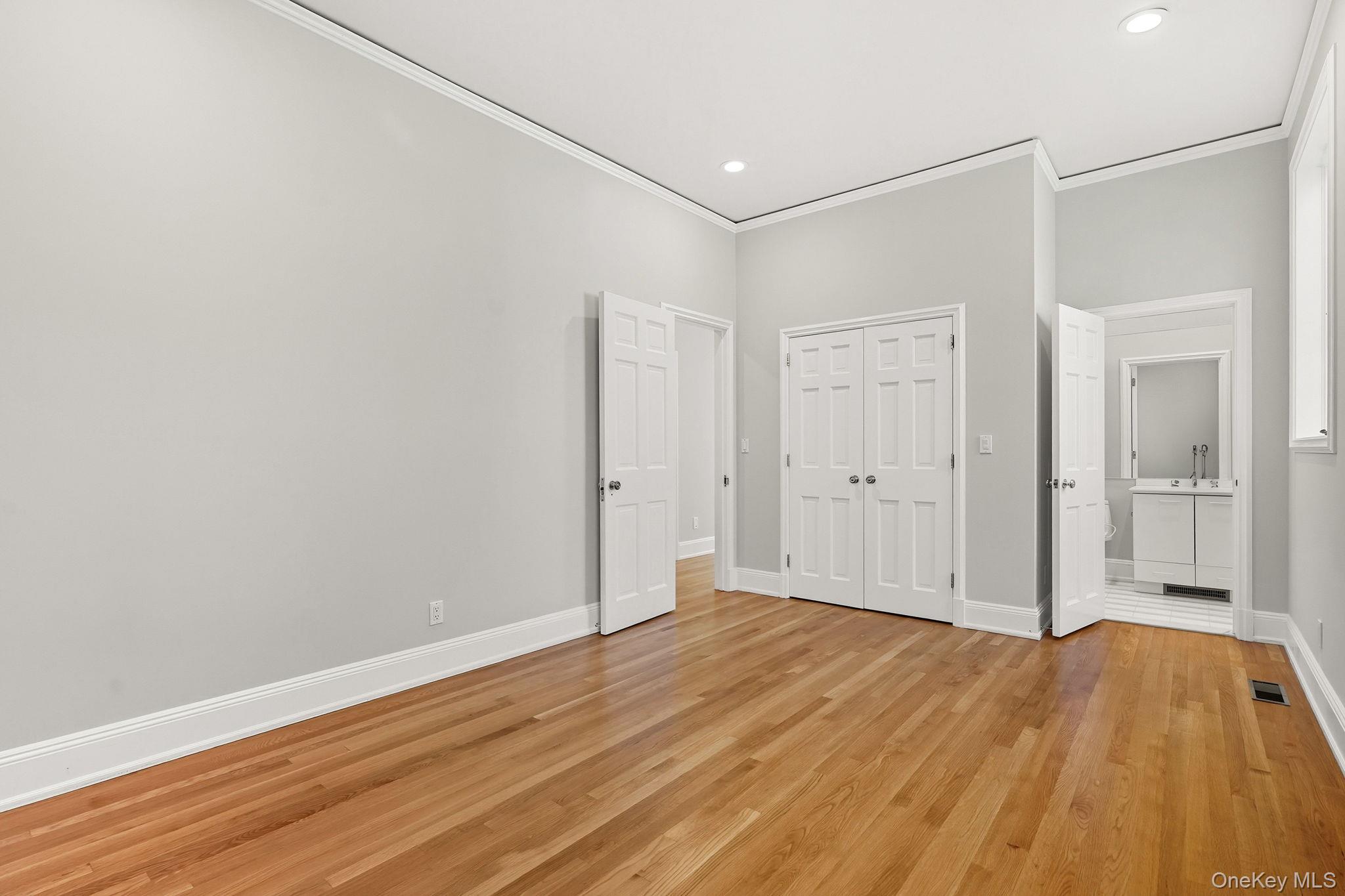 10 Cooper Road Scarsdale, NY 10583 - Photo 36 of 47 a view of a room with wooden floor