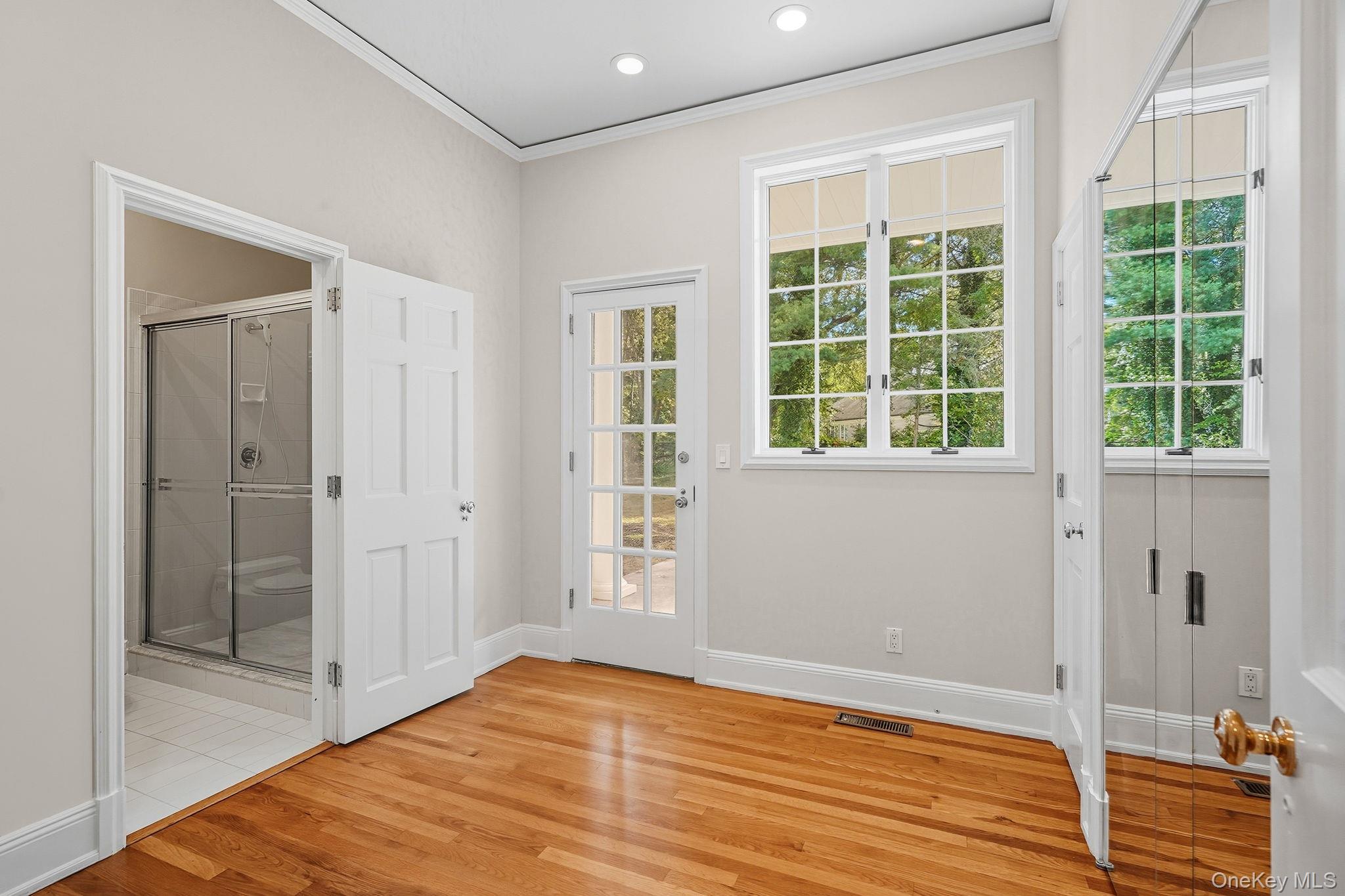 10 Cooper Road Scarsdale, NY 10583 - Photo 37 of 47 a view of empty room with wooden floor and fan