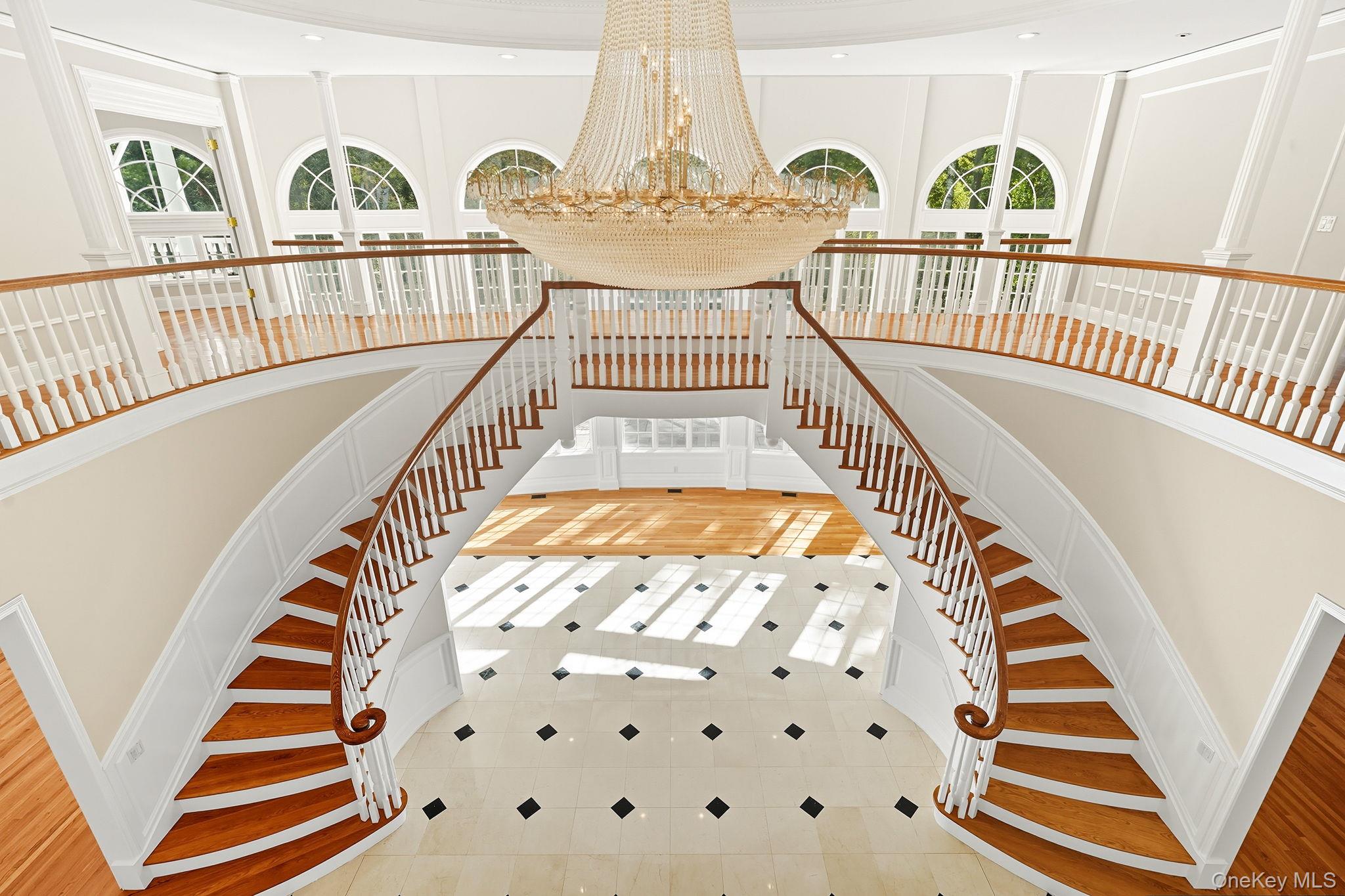 10 Cooper Road Scarsdale, NY 10583 - Photo 6 of 47 a view of entryway with wooden floor