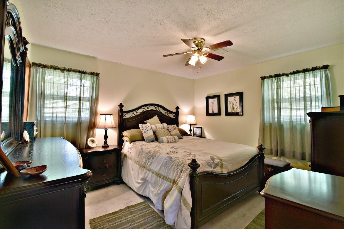 6100 McNeely Road Corryton, TN 37721 - Photo 12 of 17 a bedroom with bed and window