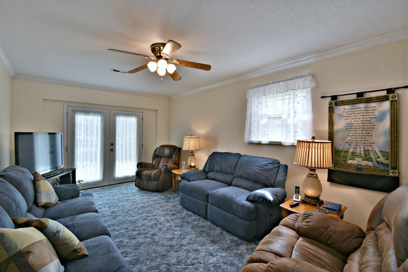 6100 McNeely Road Corryton, TN 37721 - Photo 8 of 17 a living room with furniture ceiling fan and a window