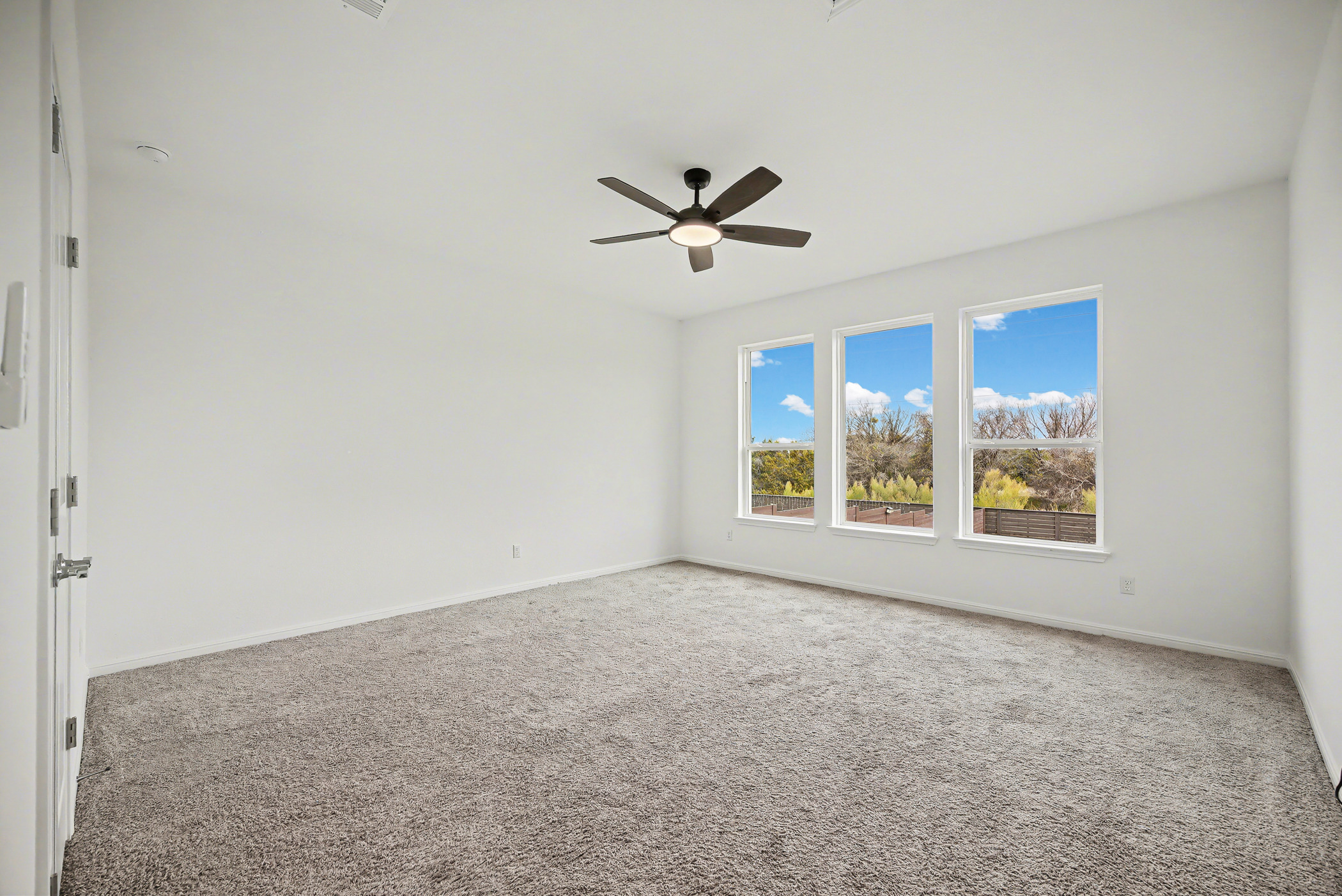 424 Spindrift Lane Leander, TX 78641 - Photo 13 of 26 a view of an empty room with a window