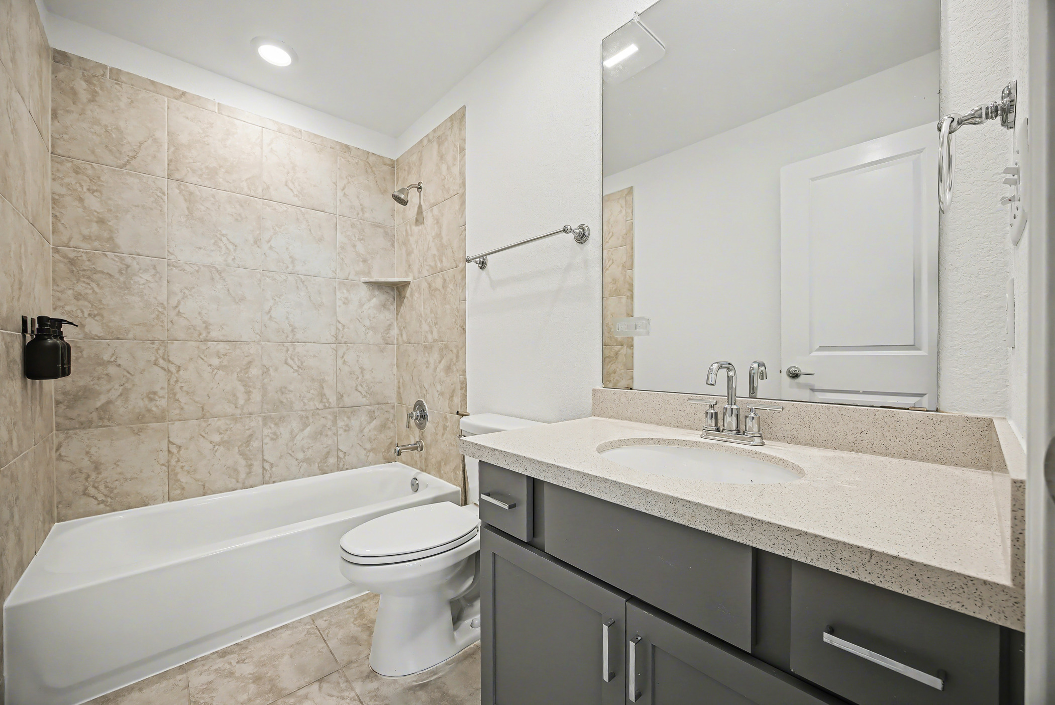 424 Spindrift Lane Leander, TX 78641 - Photo 21 of 26 a bathroom with a sink a toilet and shower