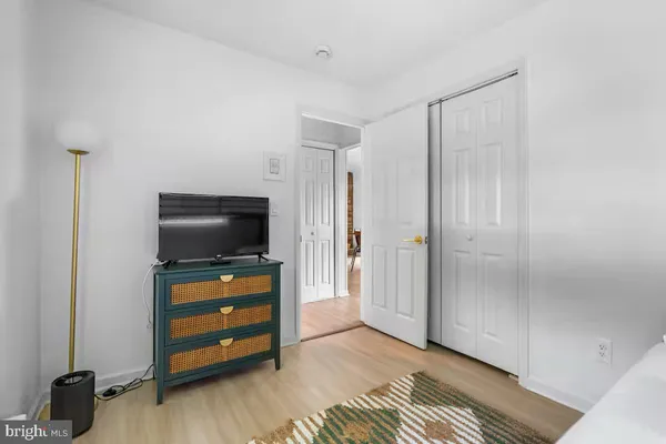 a room with furniture and flat screen tv