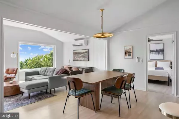a view of a livingroom with furniture and window