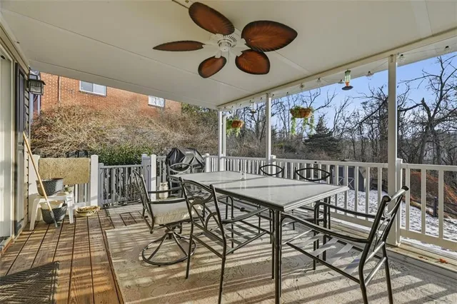 a table and chairs in a balcony